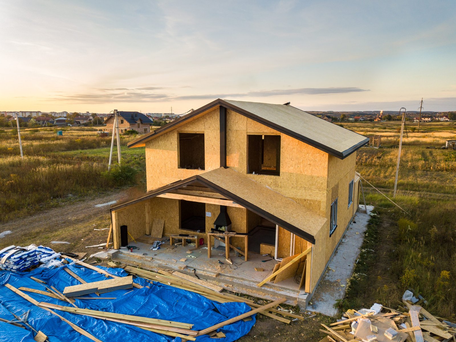 Construction of new and modern modular house. Walls made from composite wooden sip panels with styrofoam insulation inside. Building new frame of energy efficient home concept.